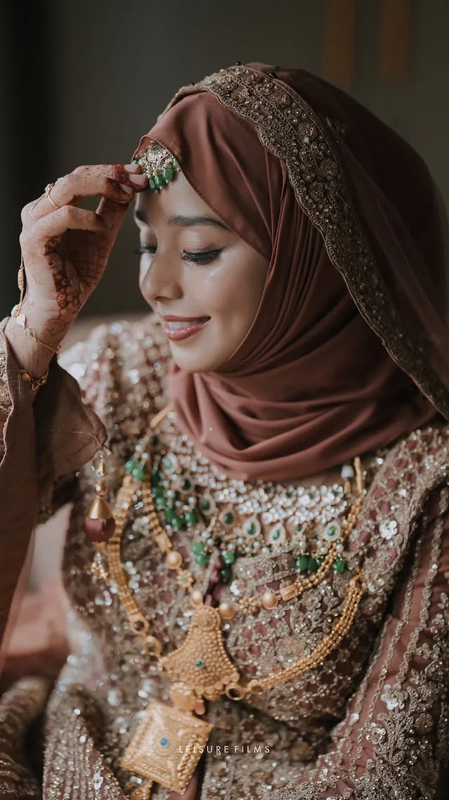 Muslim bride in traditional attire captured by the best wedding photographer in Calicut."